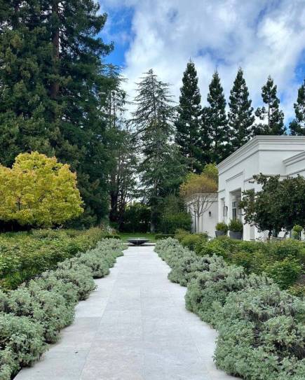 Vista Verde Estate with trees and shrubs surrounding with pathway